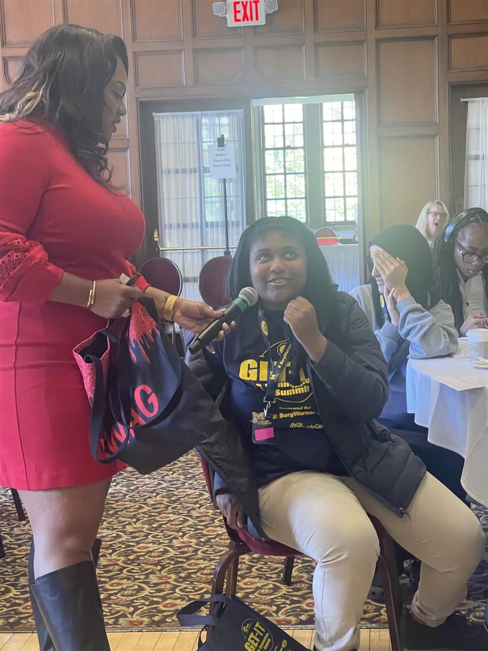  Chloe talks with the Guest Motivational Speaker